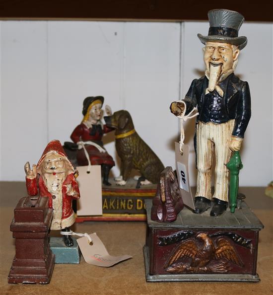 3 x painted cast iron money boxes- Uncle Sam, Santa Claus and Speaking Dog